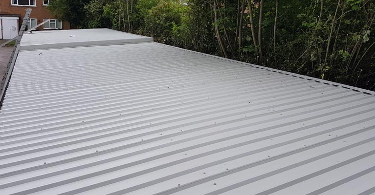 Completed 35 metre long and 6 metre wide metal cladding roofing in Sutton Coldfield.