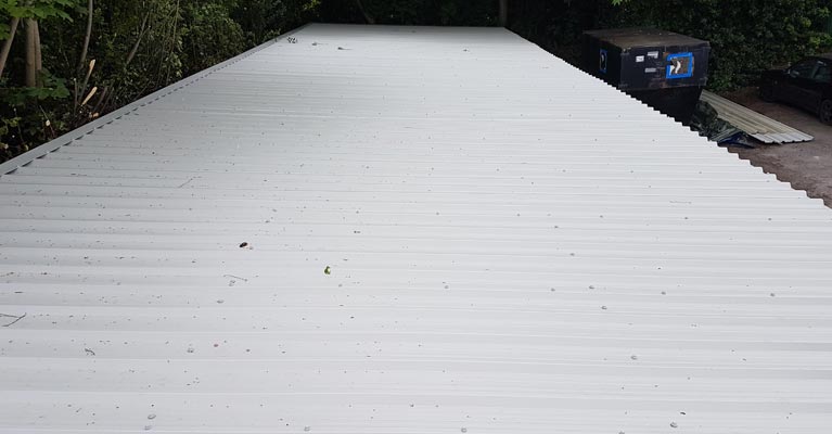 Plastisol coated steel profiled sheeting fitted by IRM Roofing.