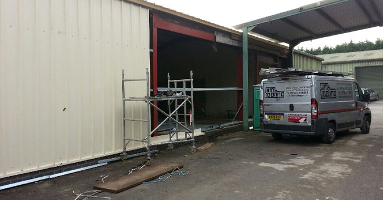 Composite wall panels half way installed