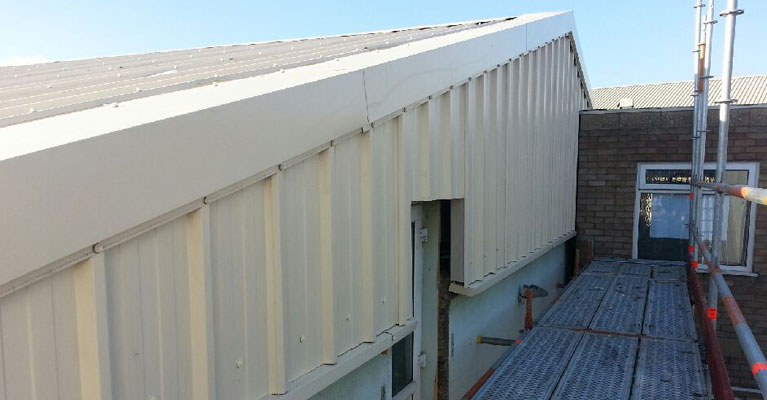 Close up of the finished plastisol coated steel corners and composite wall panels