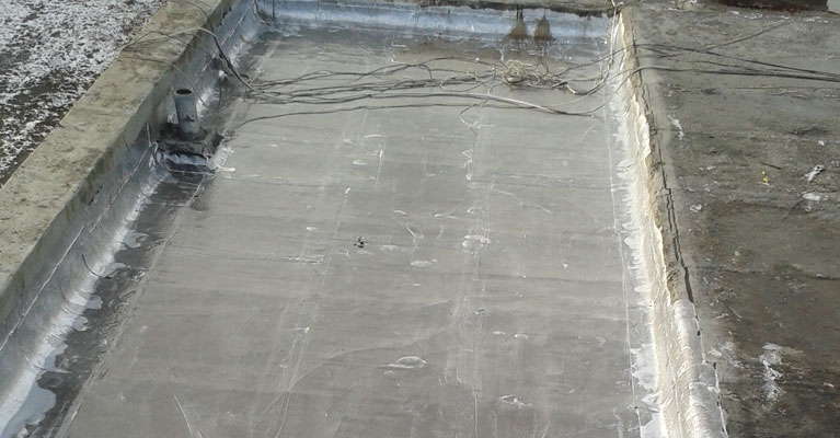 A reflective paint coating was applied to the 40 metre square area