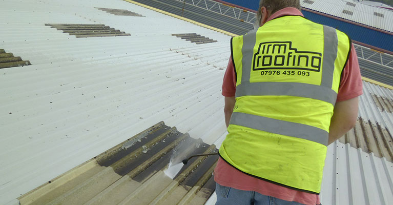 Cleaning rooflight with pressure washer