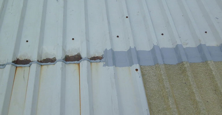 End lap prepared and seamsil mastic applied