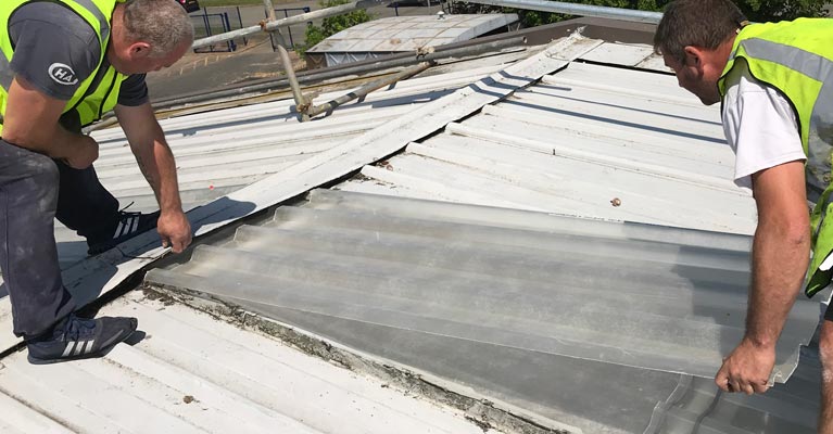Installing the Class 3 GRP outer skin to the built-up triple skin site assembly.