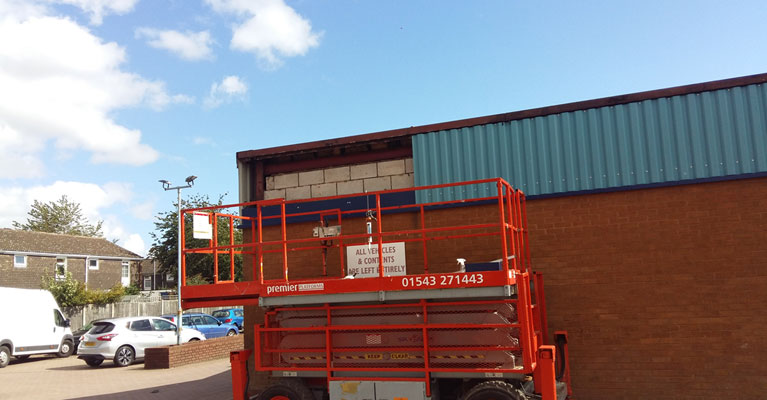 Cladding part installed to cover internal blockwork.