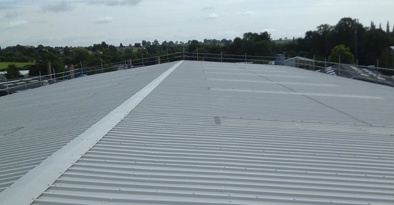 Industrial roof re-painting in Rugby