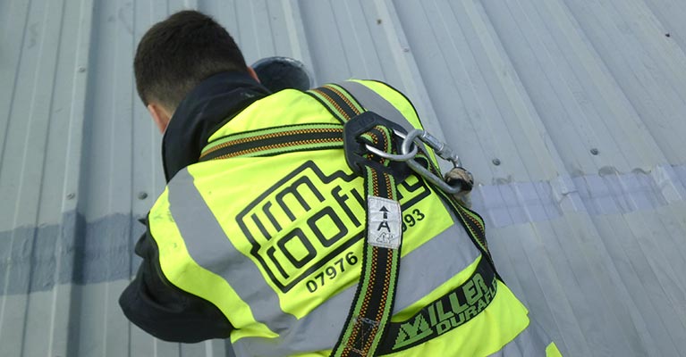 IRM Roofing Expert applying Giromax Seamsil